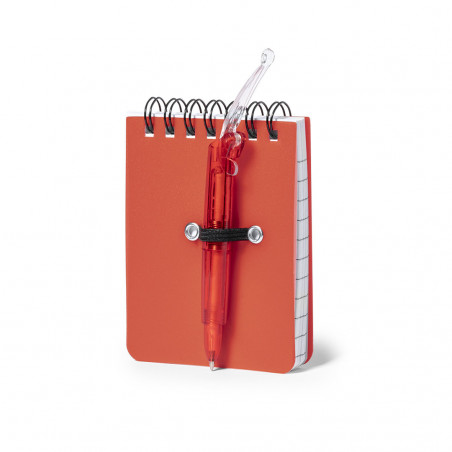 Caderno com caneta